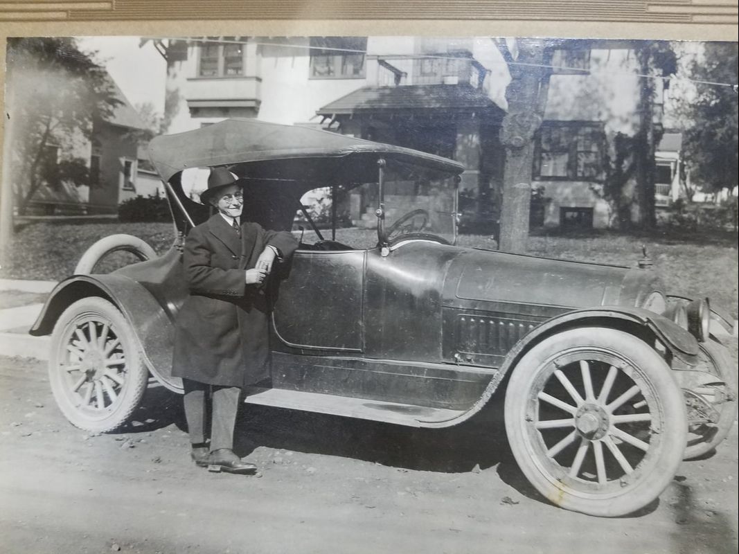 Schwartz next to car